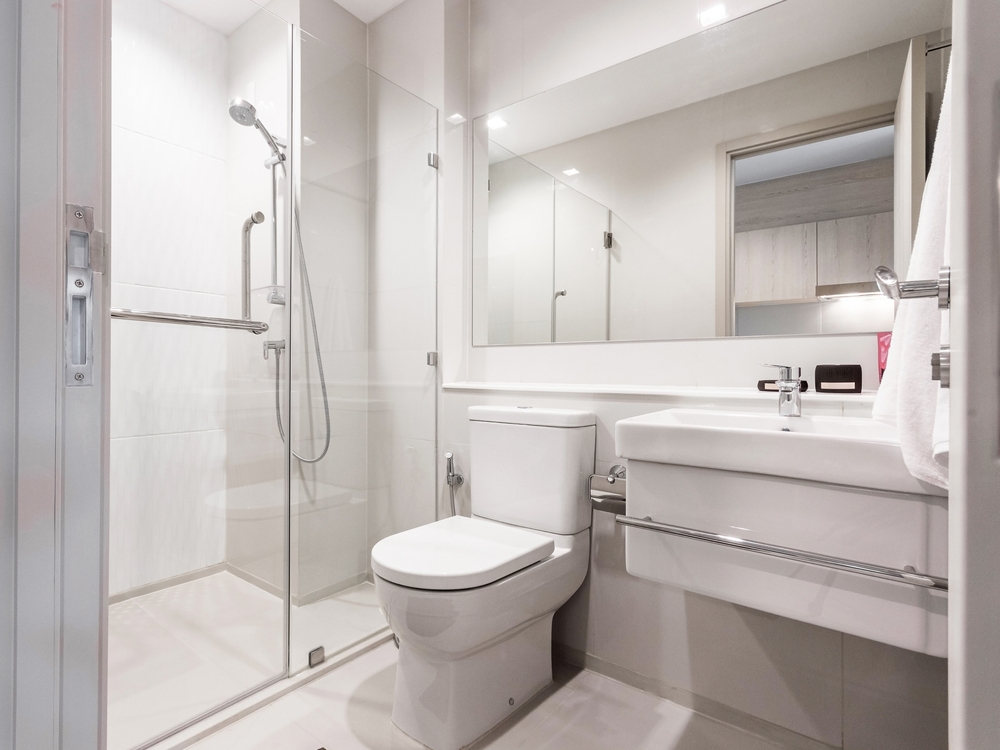 Bright bathroom with glass shower